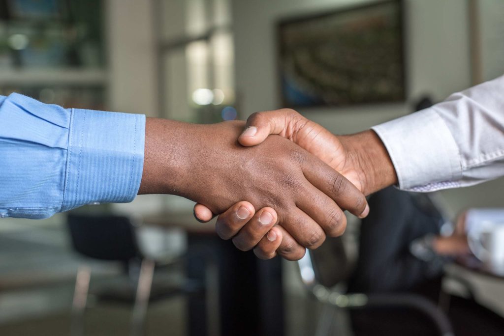 closing sales handshake