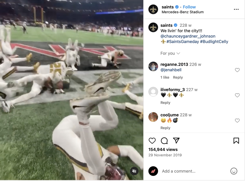 Screenshot of social media post showing football players celebrating 